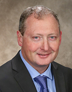 Photo of ￼Lancer Gates D.O., Clay County – Dr. Gates earned his Bachelor of Science in Pre-medicine from Penn State University; and his Osteopathic degree from Kirksville College of Osteopathic Medicine/Andrew Taylor Still University. He completed his residency training at Wilson Memorial Hospital in Johnson City, NY. He maintains his internal medicine board certification (AOBIM and ABIM). He founded Gates Hospitalists, LLC in December 2022. Gates Hospitalists provides patient care at Liberty Hospital, North Kansas City Hospital. and Carroll County Memorial Hospital. He served as an appointed member of the Board of Trustees of the Clay County Public Health Department (2021-2023). He served as President of the Missouri State Medical Society (2023-2024); the President of the Kansas City Medical Society (2014), and the President of the Kansas City Regional Osteopathic Medical Association (2018-2019). He serves on the CENTRUS Health Finance Committee. He currently serves as the President of Kansas City Metropolitan Physician Association (2023-present).